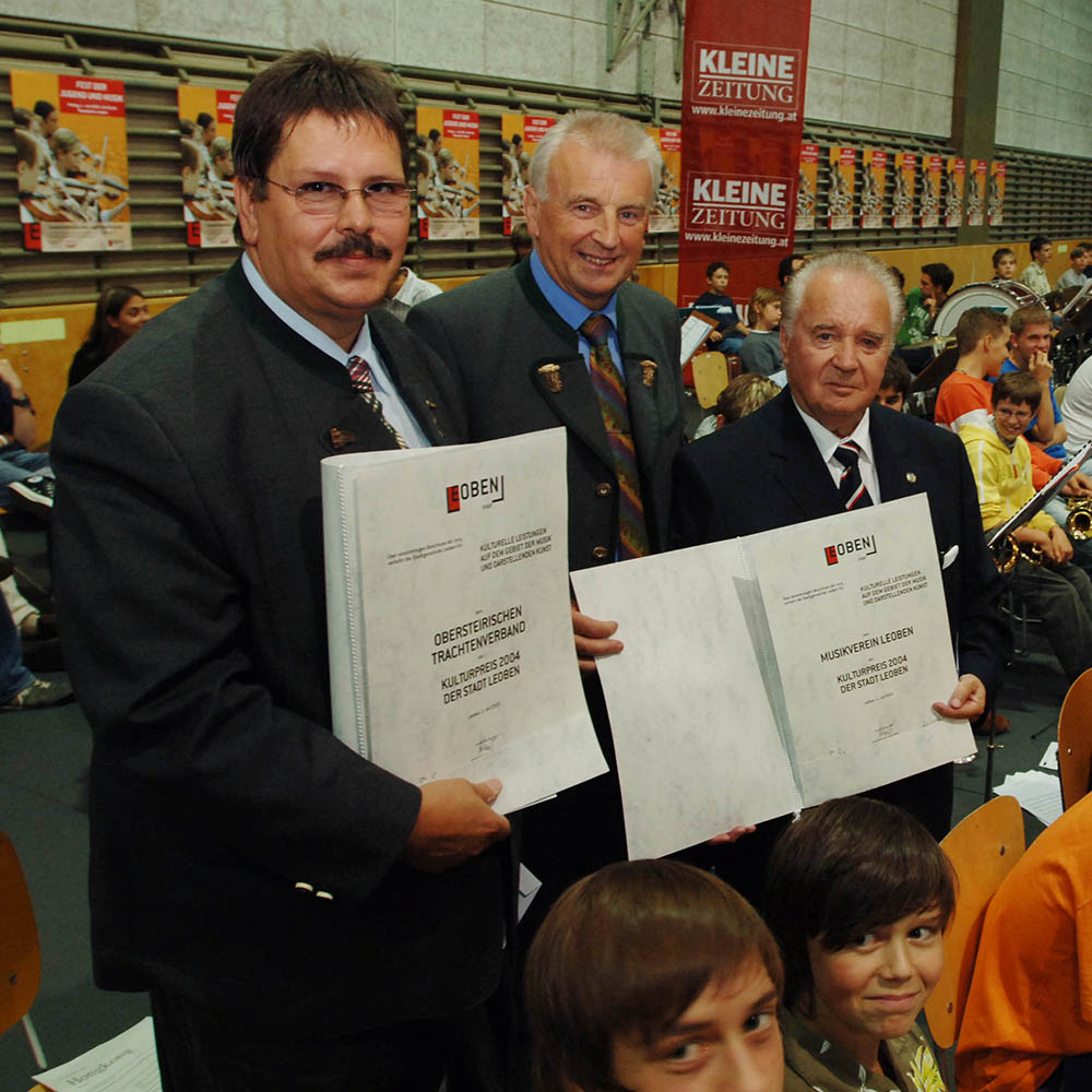 Andi Stradner, the mayor Mr. Konrad and Siegfried Ussar