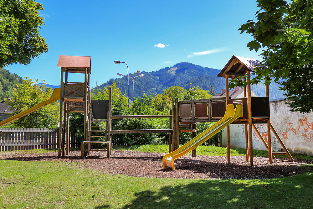 Slide and play equipment at the Alois Edlinger Gasse playground